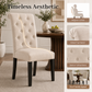 Rustic Upholstered Dining Chair with Button-Tufted Scroll Back