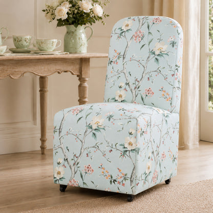 French Farmhouse Upholstered Dining Chair with Rounded Back, Caster Legs & Skirted Design