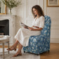 French Farmhouse Upholstered Dining Chair with Rounded Back, Caster Legs & Skirted Design