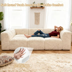 Soft sand daybed with its rounded armrests and high-density foam support – a ladyis comfortably relaxing on the daybed