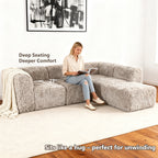 Taupe gray Sofa with One Arm and Chaise Extension showcases its deep seating design– a lady comfortably enjoys reading time on the sofa