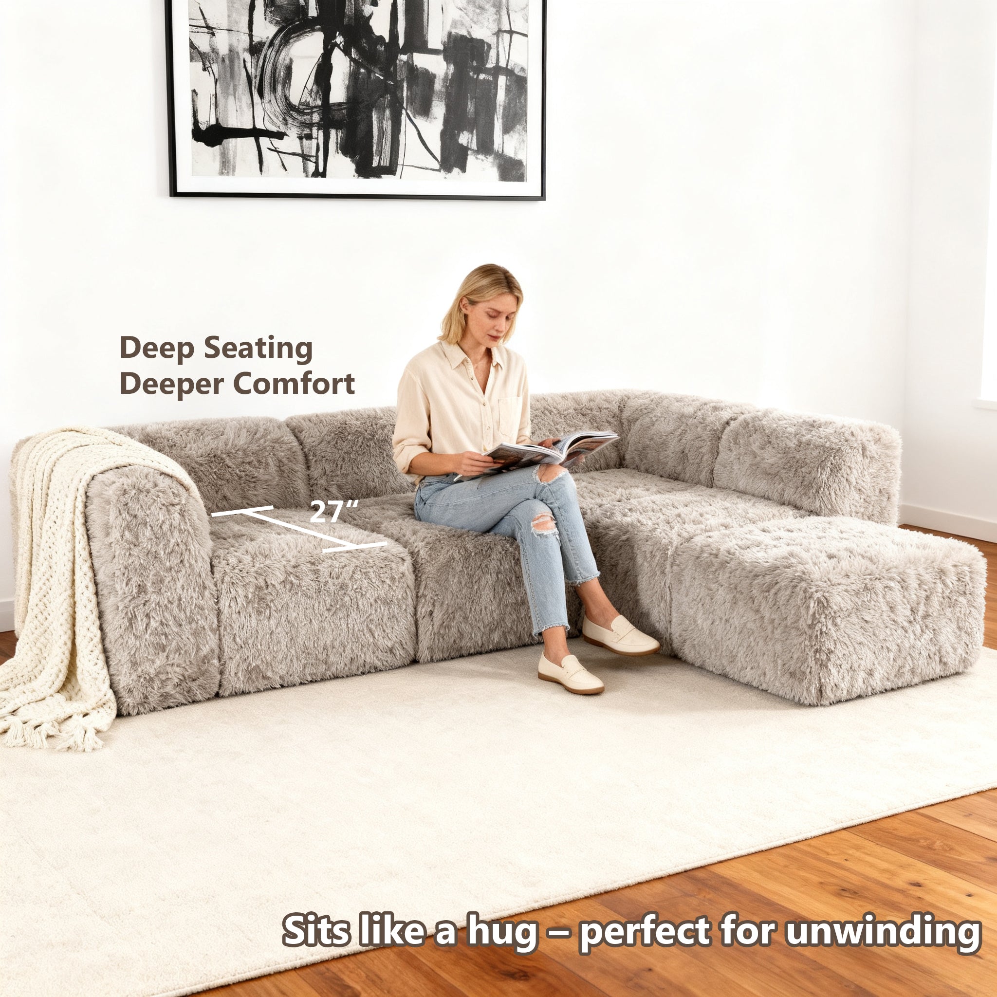 Taupe gray Sofa with One Arm and Chaise Extension showcases its deep seating design– a lady comfortably enjoys reading time on the sofa
