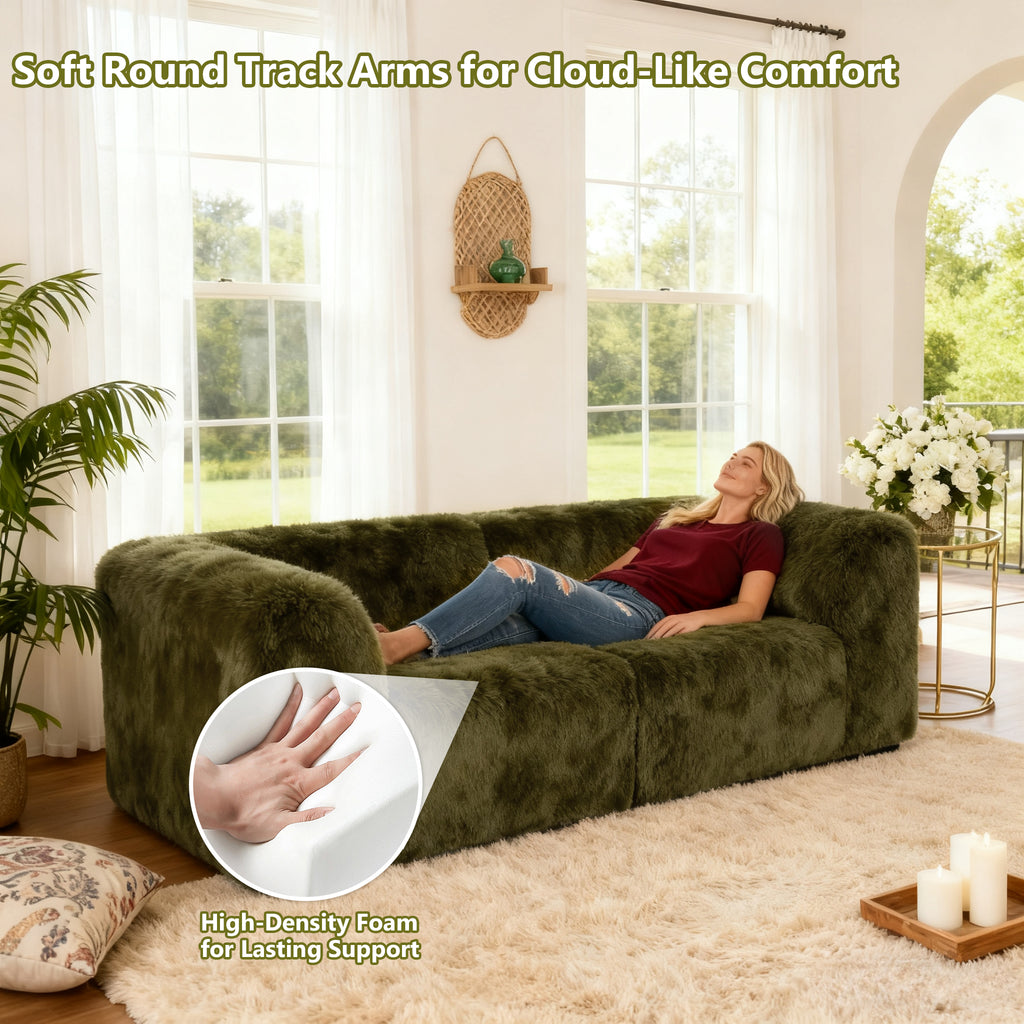 Olive greenModular Loveseat with its rounded armrests and high-density foam support – a lady is comfortably relaxing on the sofa