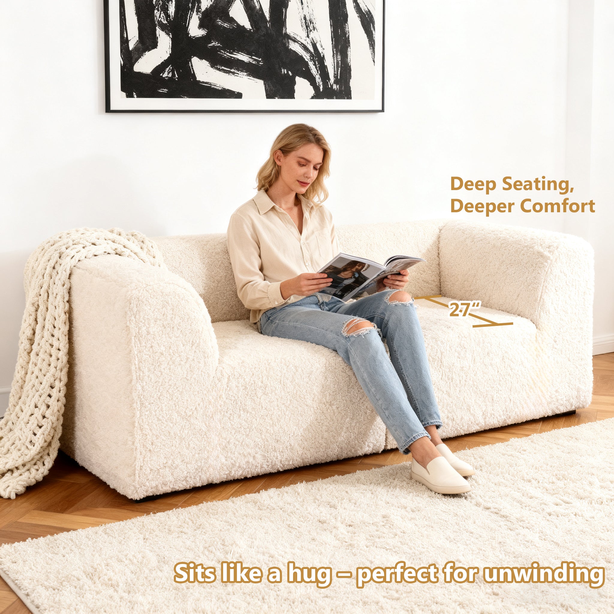 Soft sand Modular Loveseat showcases its deep seating design– a lady comfortably enjoys reading time on the sofa