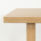 Transitional Dining Table with Trestle Base and Solid Wood Look